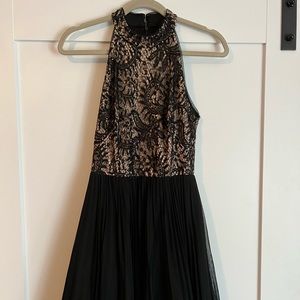 Lace, beaded, sequined, halter top dress with a tule skirt